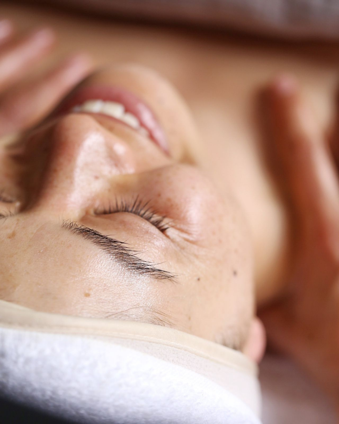 woman getting the Spring Skin Reset Facial at Reveal