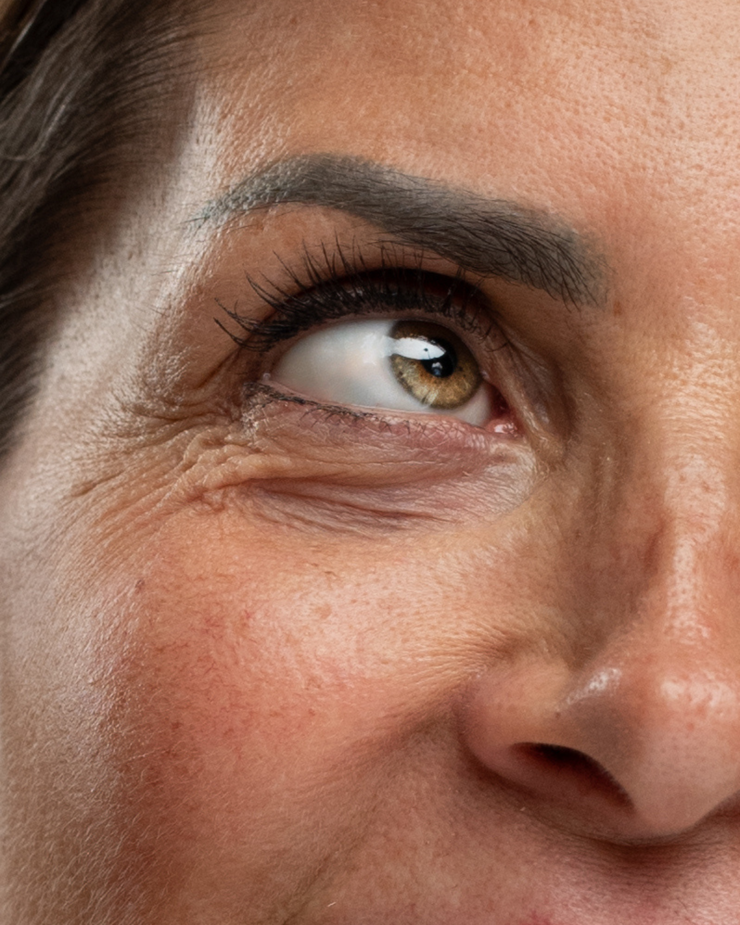 Close-up of lifted and tinted lashes after a lash lift at Reveal
